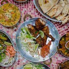 G'Raj Mahal Cafe & Lounge signature dishes The Royal Grill (Tandoori Mixed Grill)Goan Market Fish CurryMalai Kofta